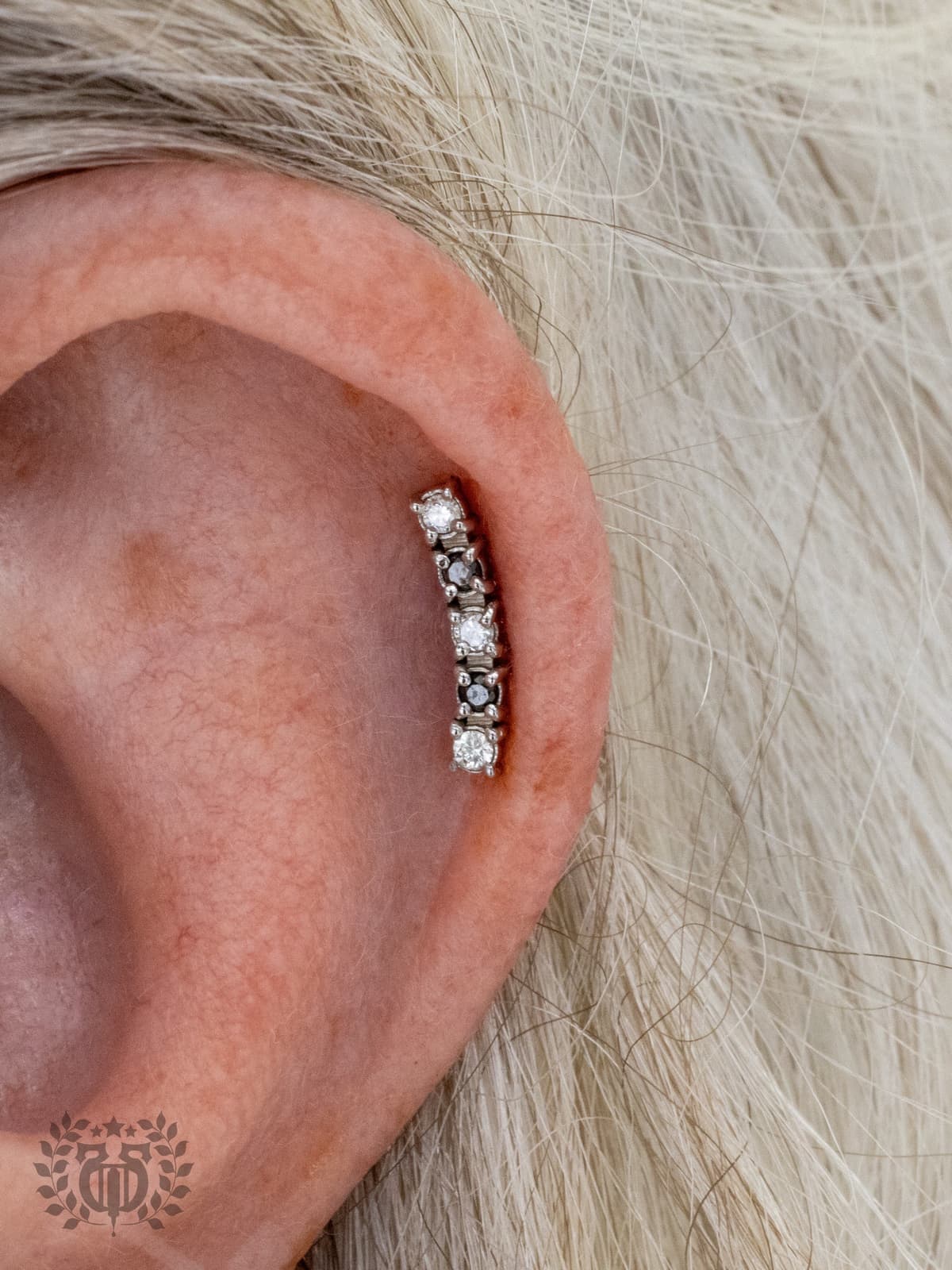 BVLA fine line earrings stacked in lobe at Apollo Studio Los Angeles