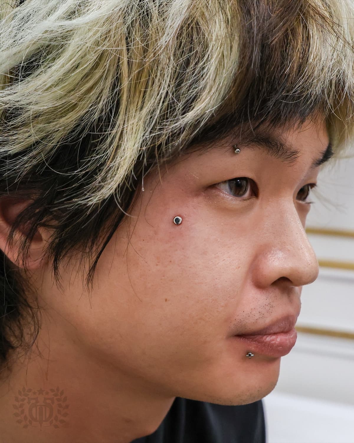 Close-up of smiley piercing with premium implant-grade jewelry