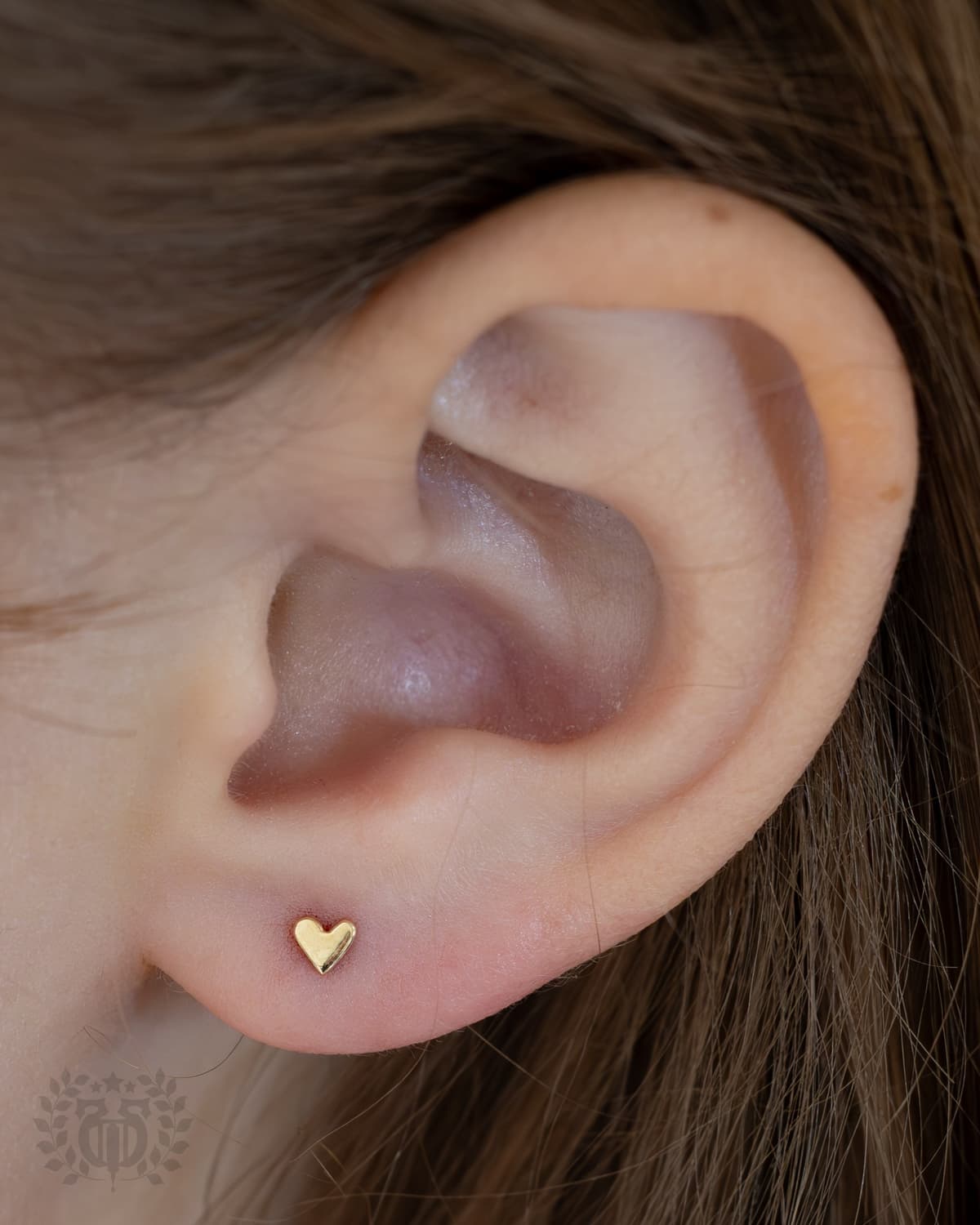 Kids ear piercing at Apollo Studio Los Angeles