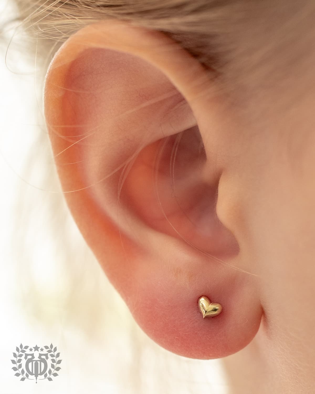 Kids ear piercing at Apollo Studio Los Angeles