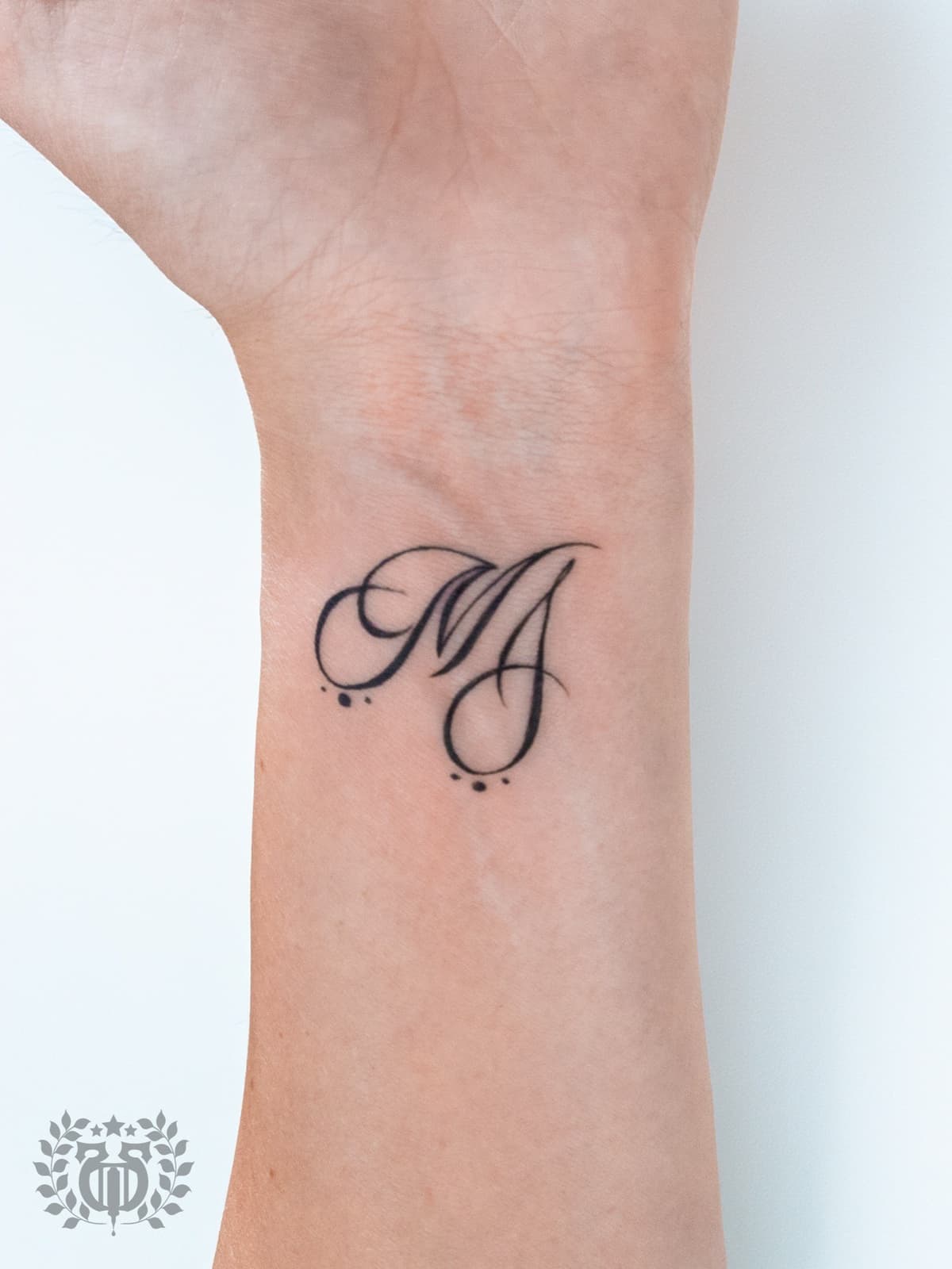 Script lettering tattoo at Apollo Studio Los Angeles